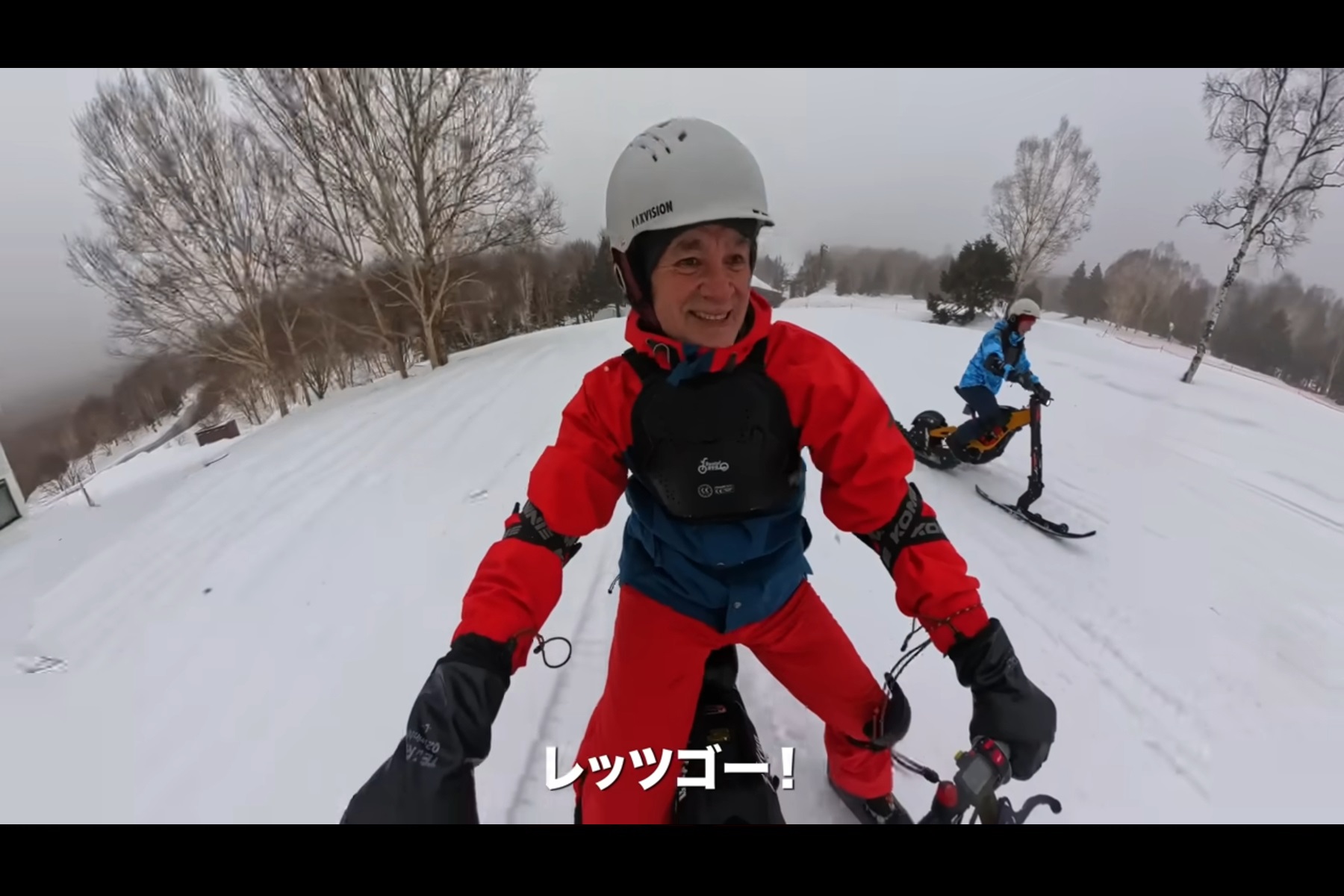 スノーバイクを堪能するオリパパ